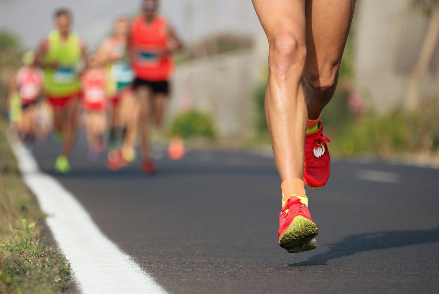 red shoe of a runner in a marathon