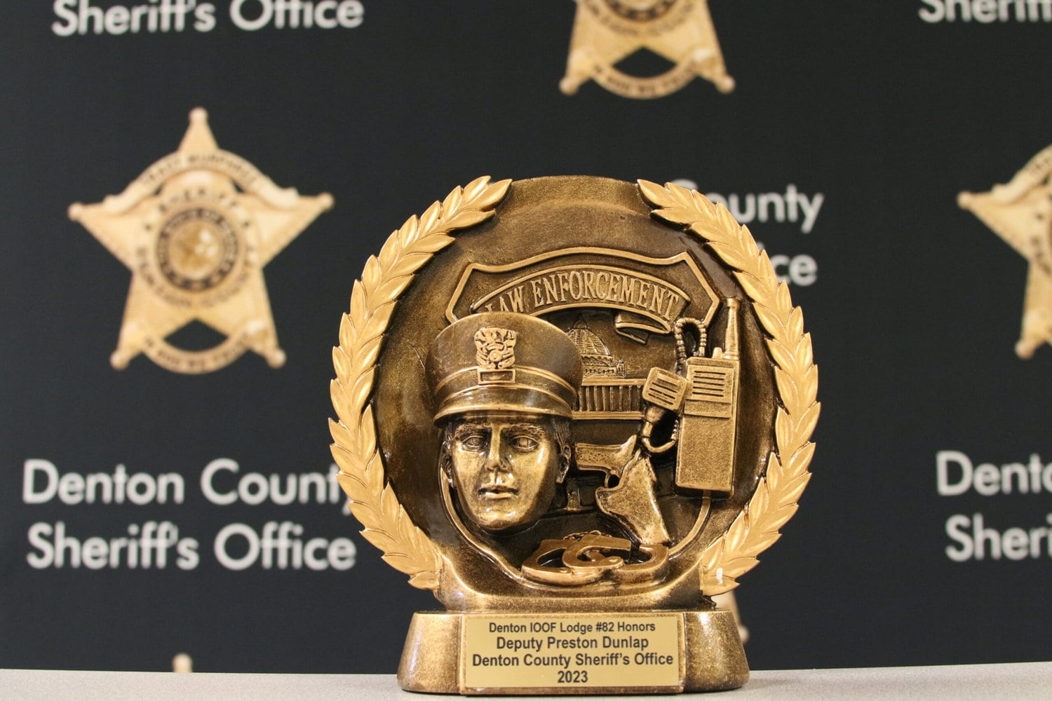 A gold Denton County Sheriff's Office officer of the year award